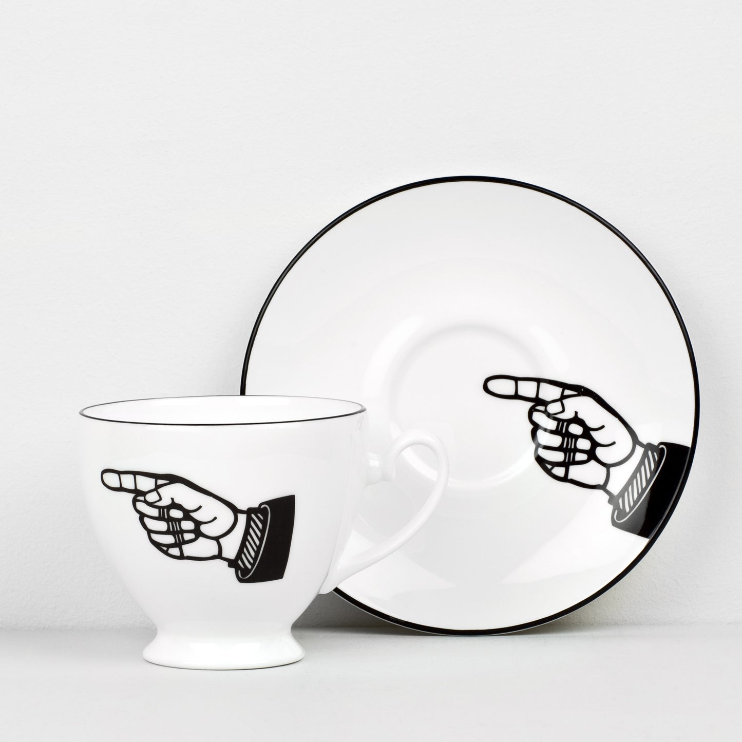 Pointing Hand Cup and Saucer